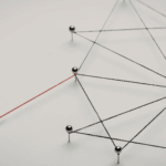 Abstract network structure with one weak connection highlighted, representing gaps in system-level decision making.
