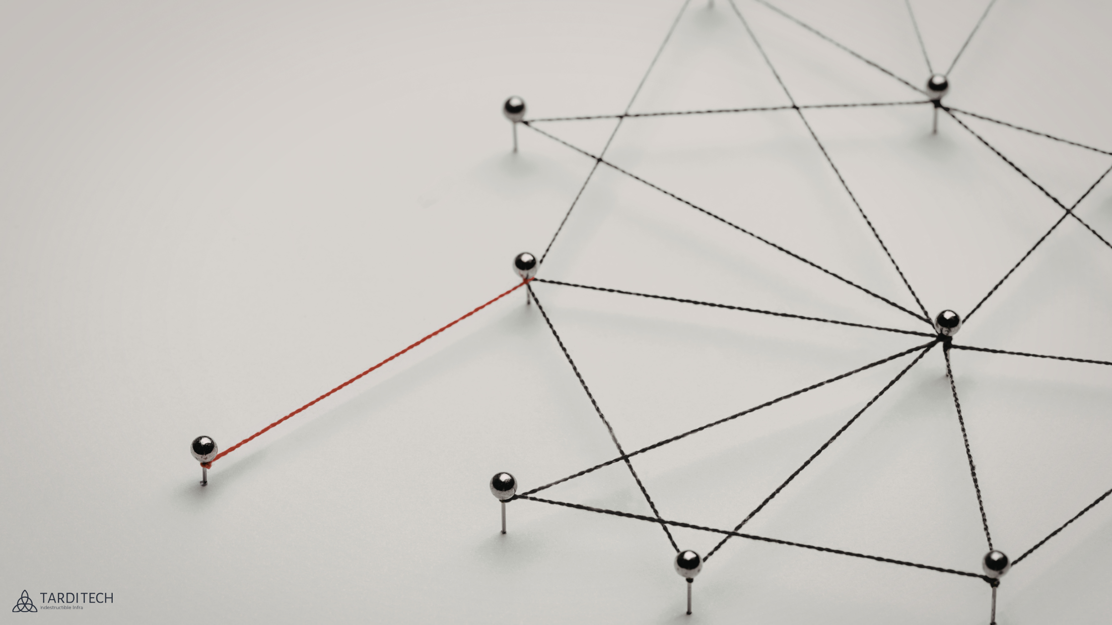 Abstract network structure with one weak connection highlighted, representing gaps in system-level decision making.